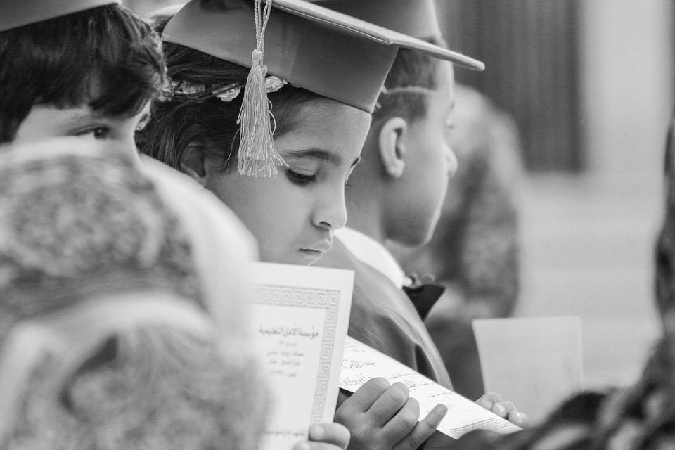 child graduating