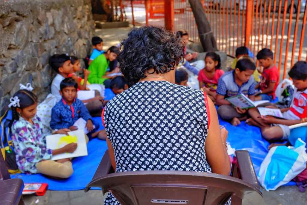 Under privileged students learning on the street