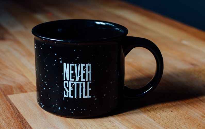 never settle mug