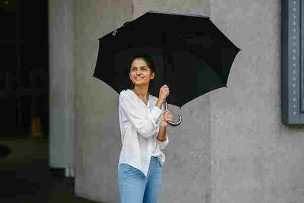 Girl holding an umbrella