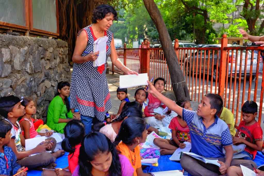 Teacher teaching on the street