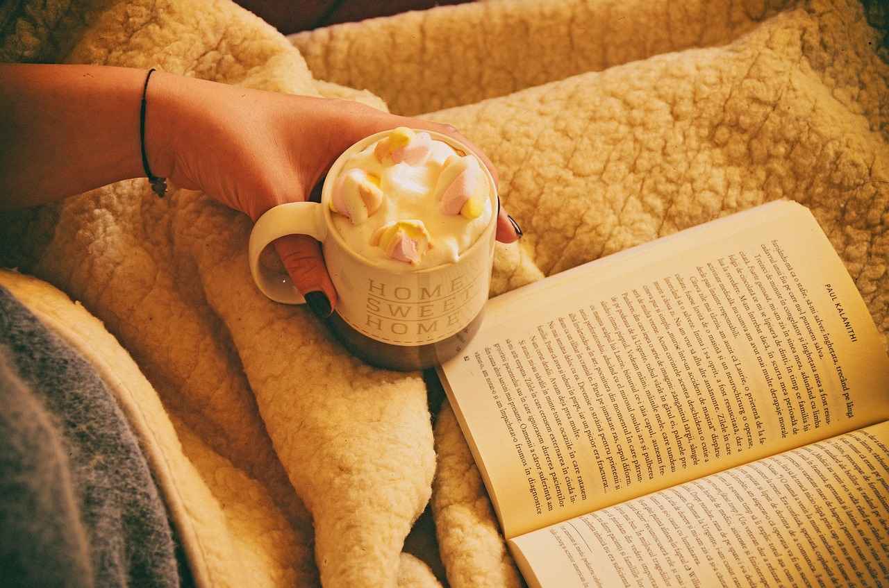 Coffee in a cup & book