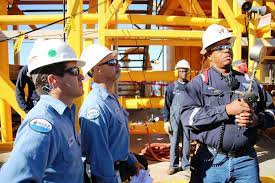 workers on an oil and gas work site