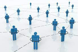 A network of people connected, forming a group.