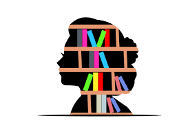 A woman's silhouette against bookshelves, symbolizing knowledge and learning.