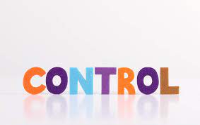 Colorful wooden letters spell out "control" on a white background.