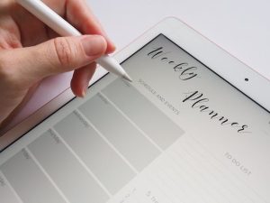 Weekly planners for iPad: A digital calendar app displaying a weekly view with customizable events and reminders.