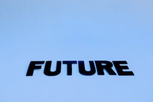Alt text: "The word 'future' written on a white surface."