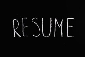 Resume is written in white on black board