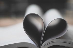 Book pages folded into a heart shape, representing affection and passion.